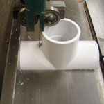 Image of tee being cut
